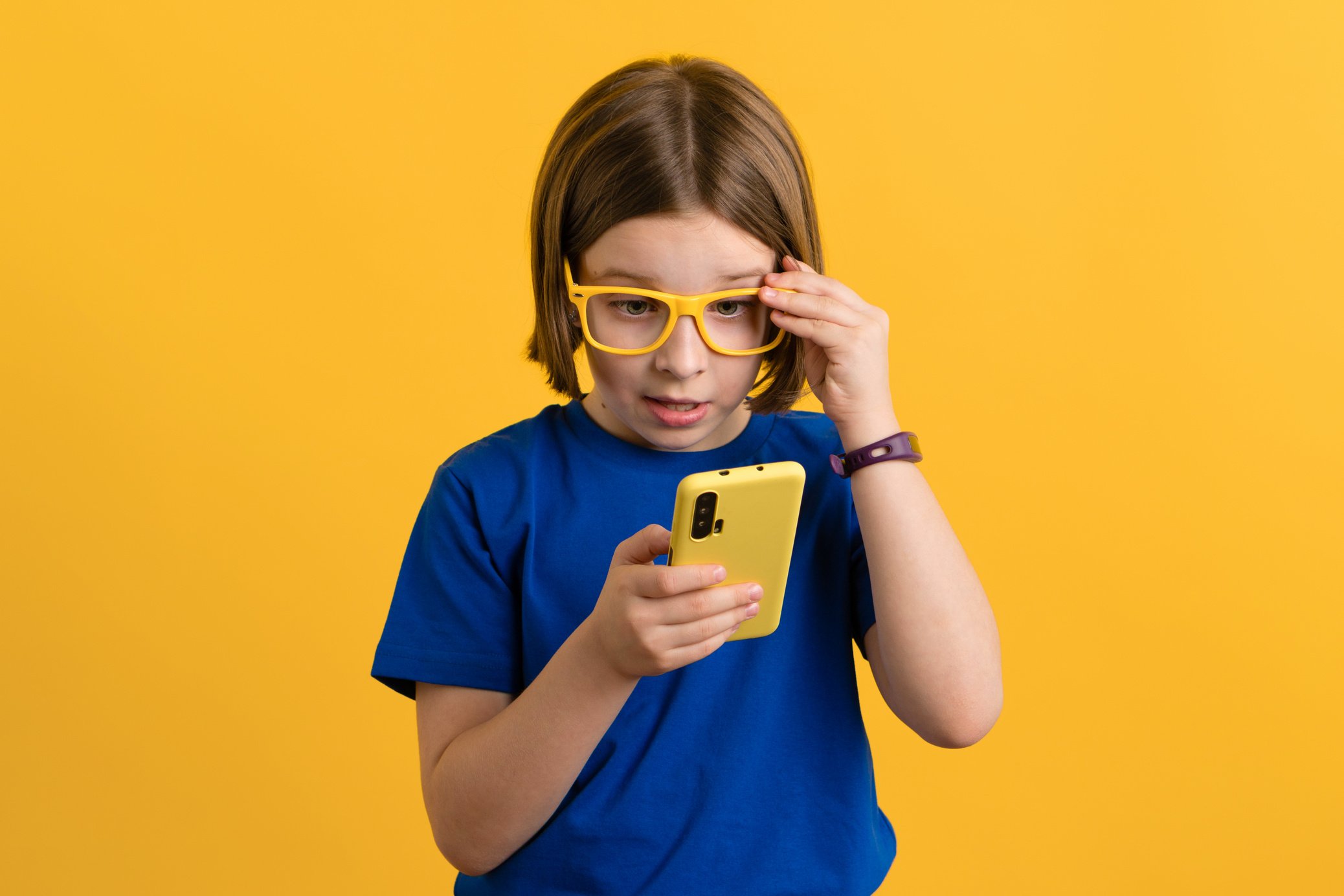 Child with Smartphone in Studio