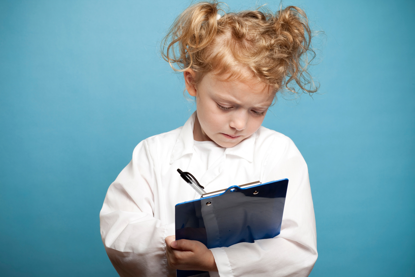 Child Doctor with Clipboard and Pen